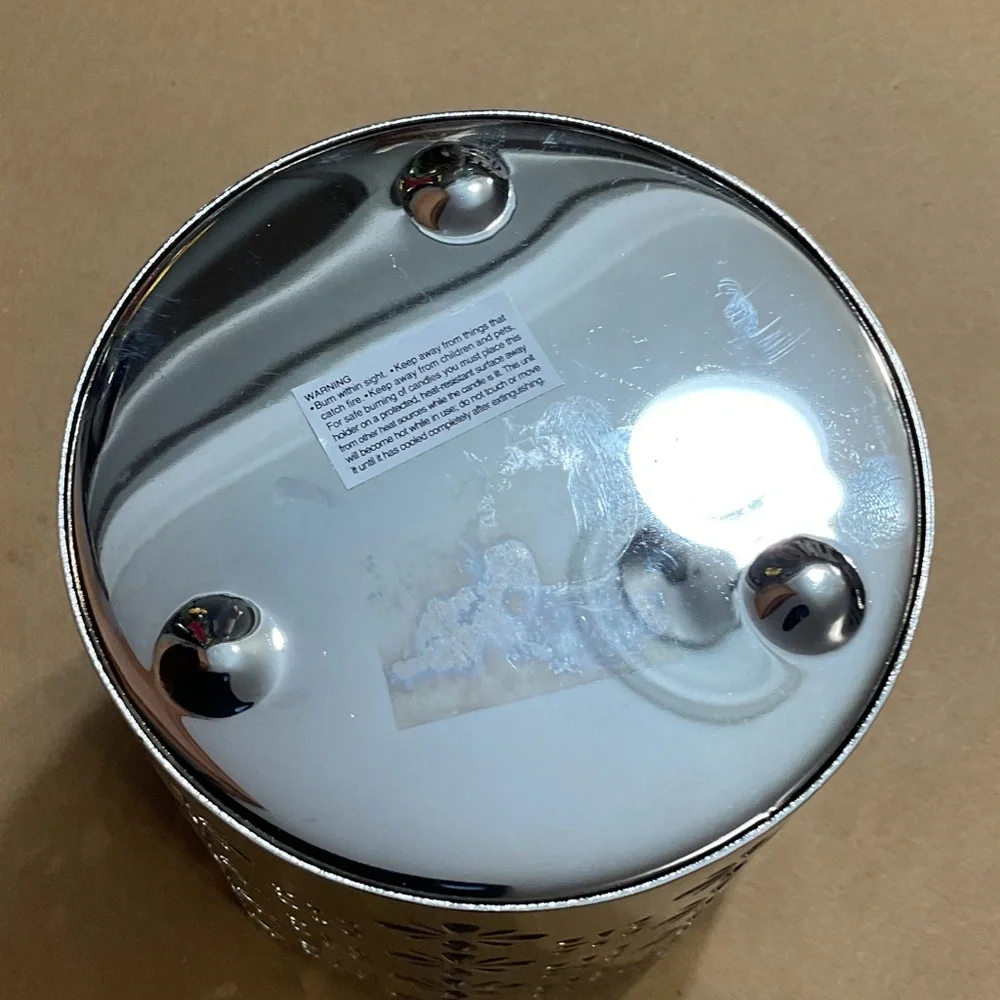 Elegant Silver Floral Cutout Candle Holder